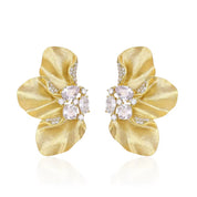 Sculptural Brushed Gold floral petal earrings with zirconia white gemstones on a white background