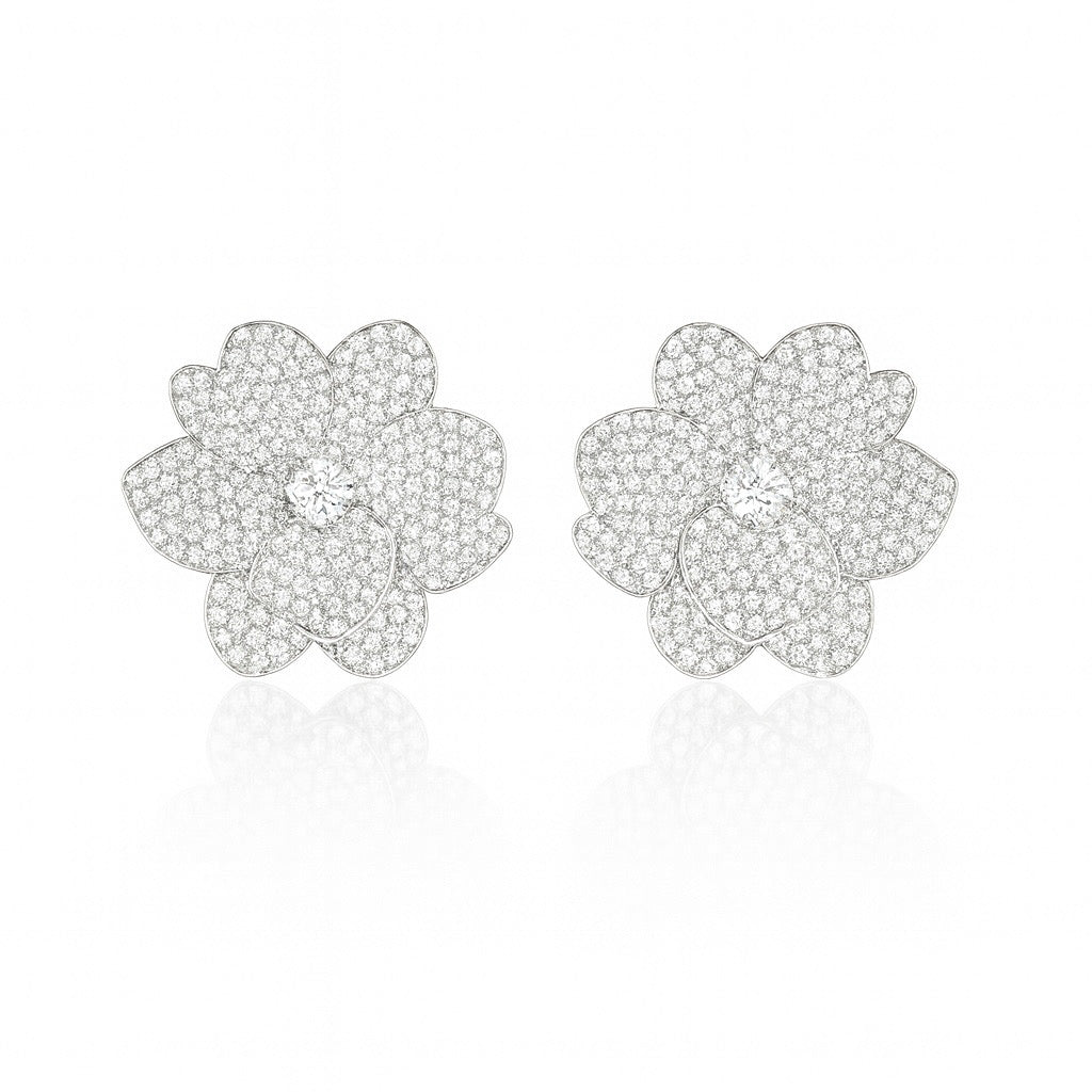 Sculptural floral earrings with micro pavé AAA cubic zirconia, rhodium-plated and sized 1.77cm x 1.86cm. Romantic small-to-medium studs in Valentina Rose gift box.