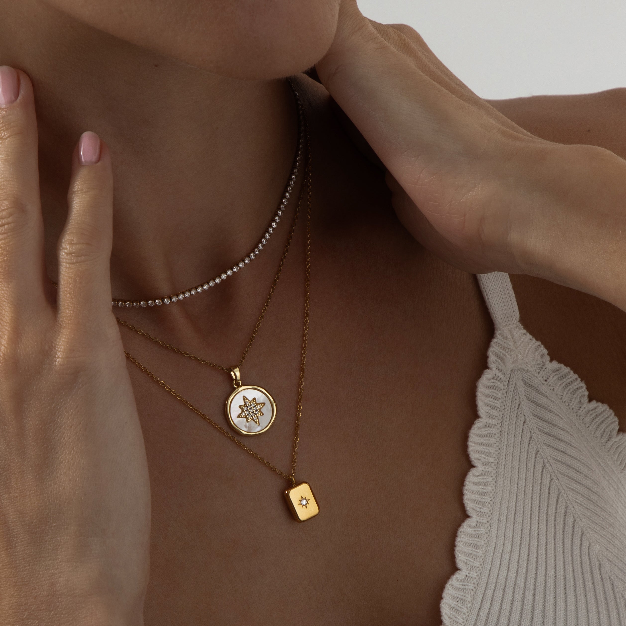 Gold pendant necklace featuring a polished star charm on a fine chain, part of the Illuminate Collection by Valentina Rose.