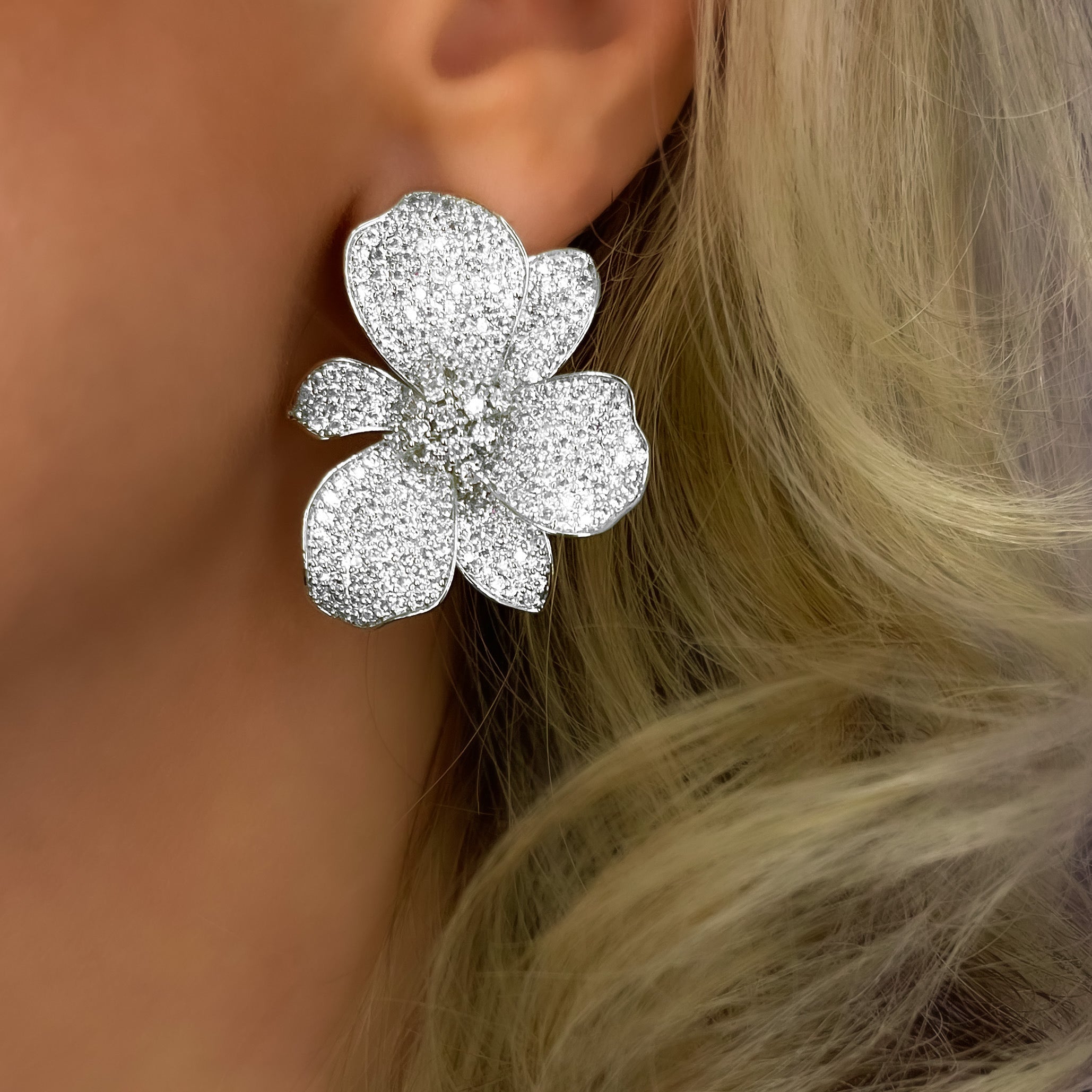 Silver wild orchid earrings, Micro-pavé silver floral earrings, Crystal cluster silver statement earrings, Luminous white shimmer silver earrings, Elegant silver plated flower earrings, Sparkling silver cocktail earrings, Chic silver earrings for special occasions