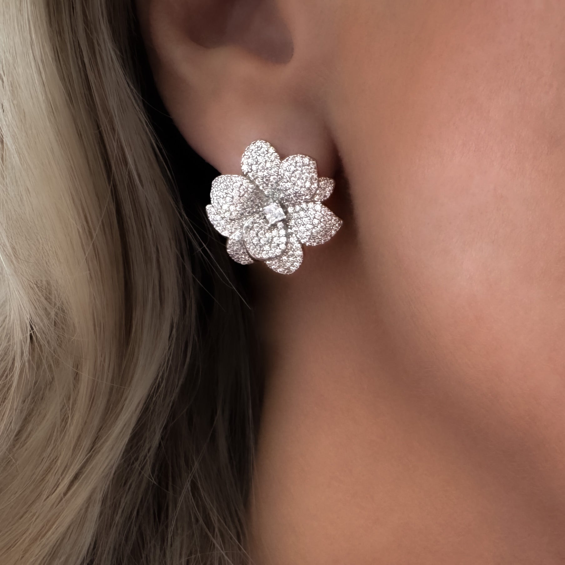 Sculptural floral earrings with micro pavé AAA cubic zirconia, rhodium-plated and sized 1.77cm x 1.86cm. Romantic small-to-medium studs in Valentina Rose gift box.
