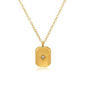 Minimalist gold pendant necklace featuring a rectangular design with a central cubic zirconia stone, inspired by the North Star