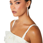 Crystal embellished reversible strand earrings, Long and short crystal strand earrings, Trendsetting front-back earring design, Double strand crystal earrings with sleek finish, As seen on Tess Daly BBC Strictly earrings, Modern reversible crystal shimmer earrings, Playful sparkling crystal earrings