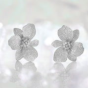 Silver wild orchid earrings, Micro-pavé silver floral earrings, Crystal cluster silver statement earrings, Luminous white shimmer silver earrings, Elegant silver plated flower earrings, Sparkling silver cocktail earrings, Chic silver earrings for special occasions