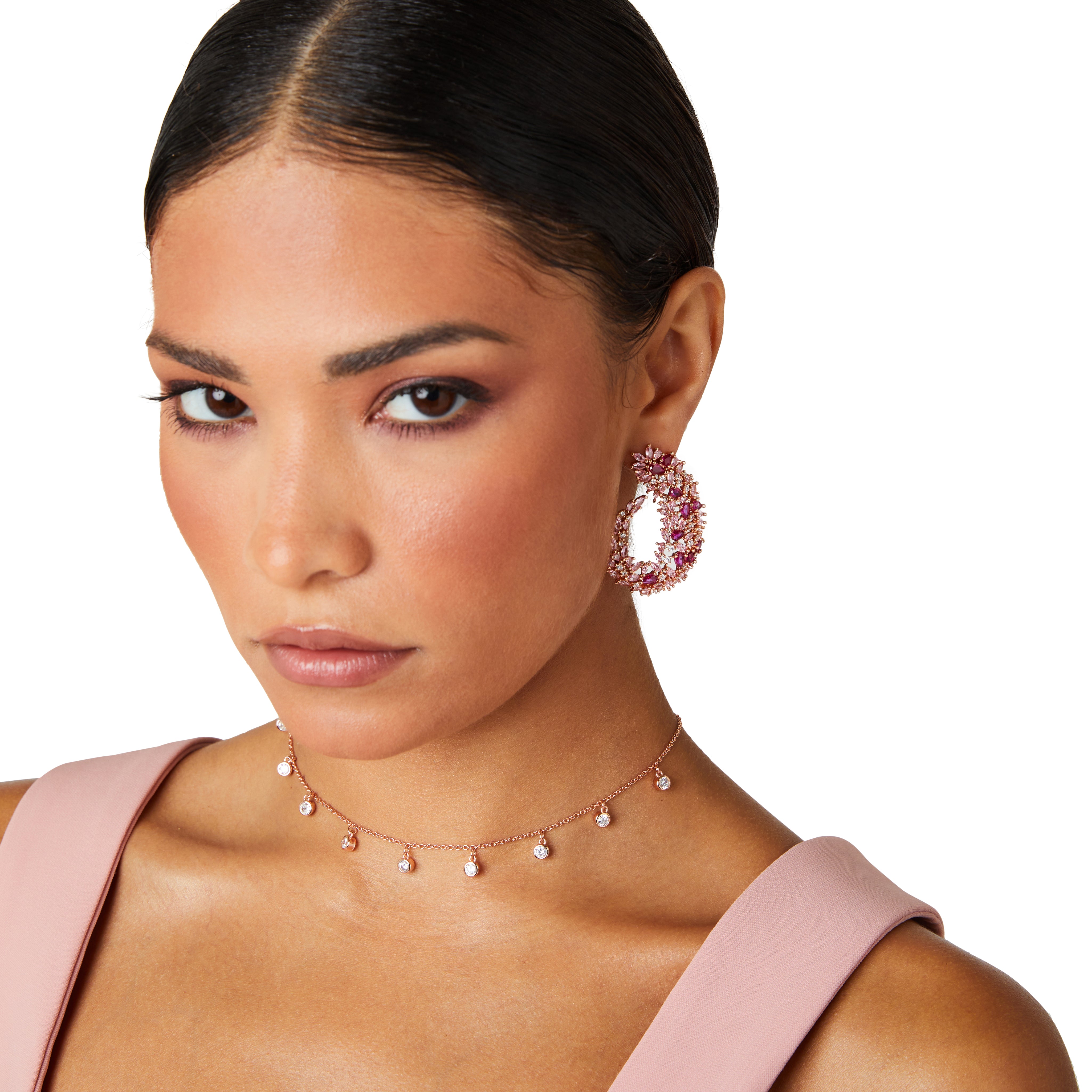 Rose gold drop earrings inspired by Japanese cherry blossoms, featuring marquise pink crystals and a sleek, curvy design for elegant statement style.