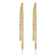 Gold reversible strand earrings, Two-strand gold crystal embellished earrings, Front and back wearable gold earrings, Sleek polished gold earrings with crystal detail, Trendsetting gold earrings as seen on Tess Daly, Modern gold earrings with playful sparkle, Elegant gold earrings with shimmering strands
