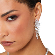 Starlet Supreme earrings, silver drop earrings, long statement earrings, geometric cubic zirconia, sparkling detail, worn by Tess Daly, BBC Strictly Come Dancing, model wearing earrings, evening jewelry, special occasion earrings, elegant design, party earrings, wedding guest jewelry, red carpet style