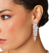 Starlet Supreme earrings, silver drop earrings, long statement earrings, geometric cubic zirconia, sparkling detail, worn by Tess Daly, BBC Strictly Come Dancing, model wearing earrings, evening jewelry, special occasion earrings, elegant design, party earrings, wedding guest jewelry, red carpet style