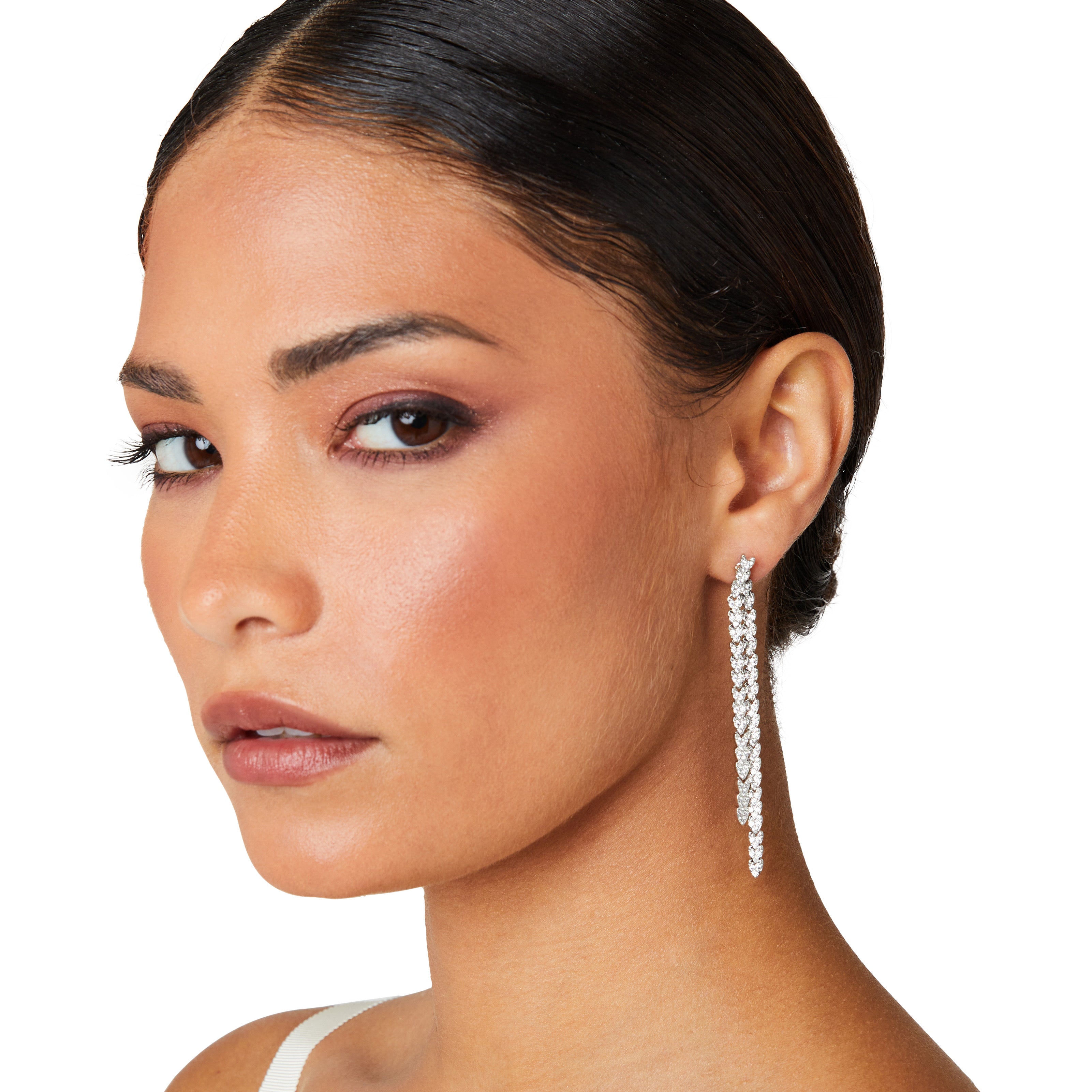 Crystal embellished reversible strand earrings, Long and short crystal strand earrings, Trendsetting front-back earring design, Double strand crystal earrings with sleek finish, As seen on Tess Daly BBC Strictly earrings, Modern reversible crystal shimmer earrings, Playful sparkling crystal earrings