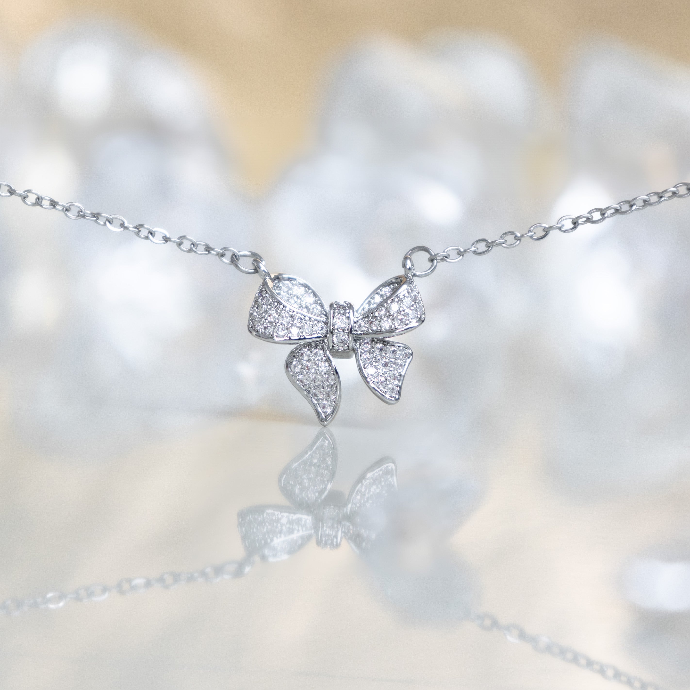 Silver bow necklace, elegant pendant