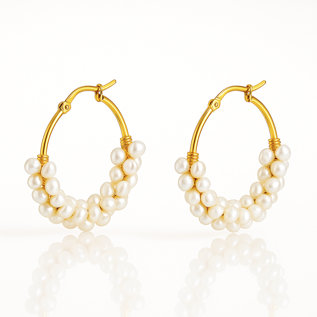 Elegant gold hoop earrings with luminous freshwater pearls — perfect as a bridal or anniversary gift