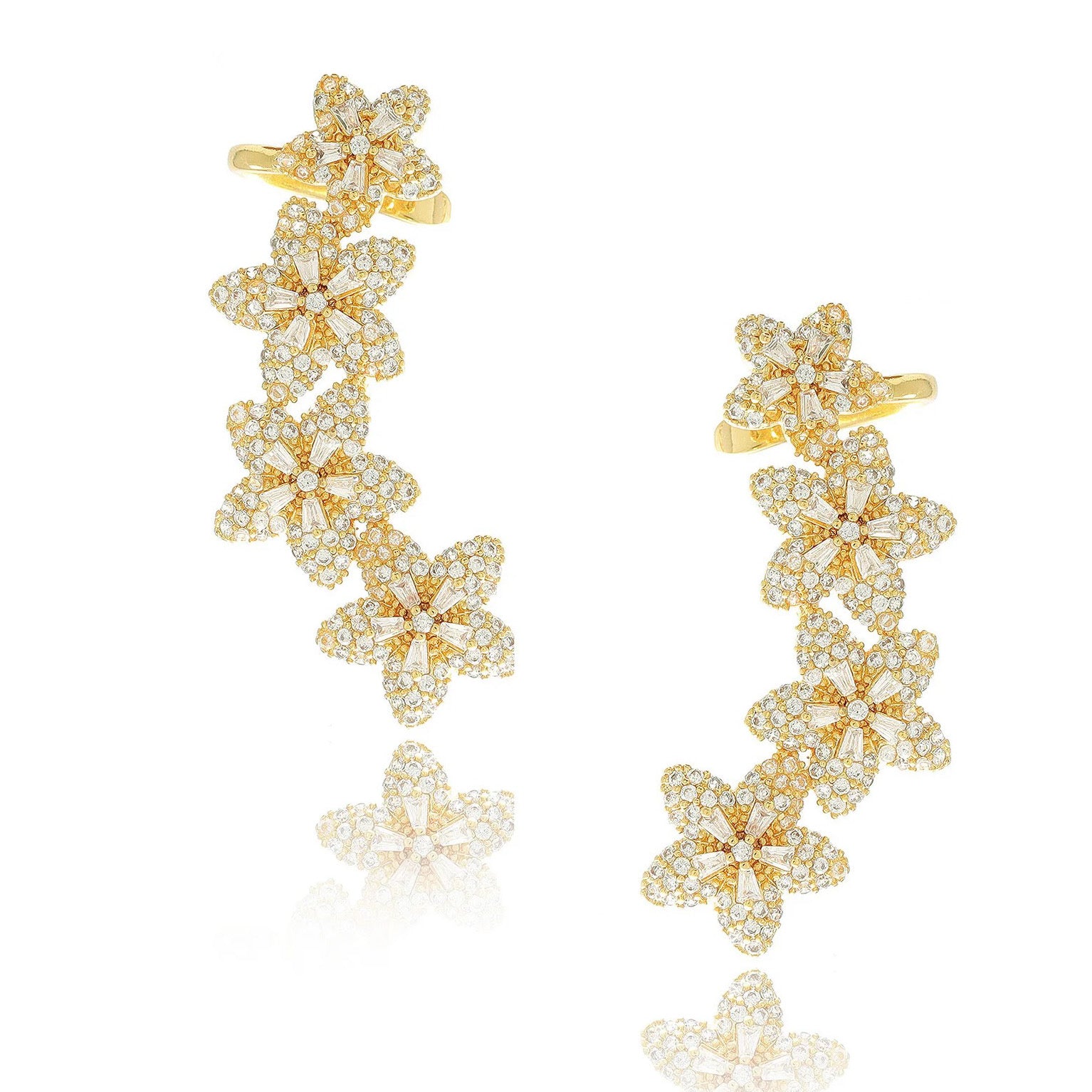A pair of ear climbers designed to trace the curve of the earlobe, each featuring four small floral motifs graduating in size. Each flower is crafted in polished gold‑plated metal with delicate pavé-set round cubic zirconia centres and petals. The climbers measure approximately 4.1 cm in height and 2.3 cm in width, following the natural contour of the ear. They secure via a long, slightly curved post and a backing near the top flower to ensure a snug upward fit. The combination of warm gold and sparkling st