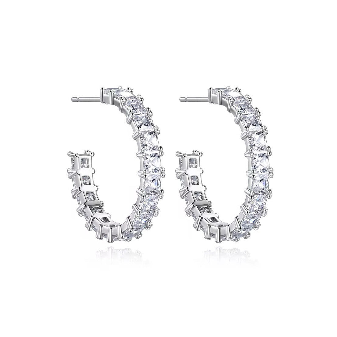 Medium rhodium-plated hoop earrings with AAA princess cut cubic zirconia, 2.4cm x 3.9cm. Elegant sparkle for everyday or evening wear, gift-boxed by Valentina Rose.