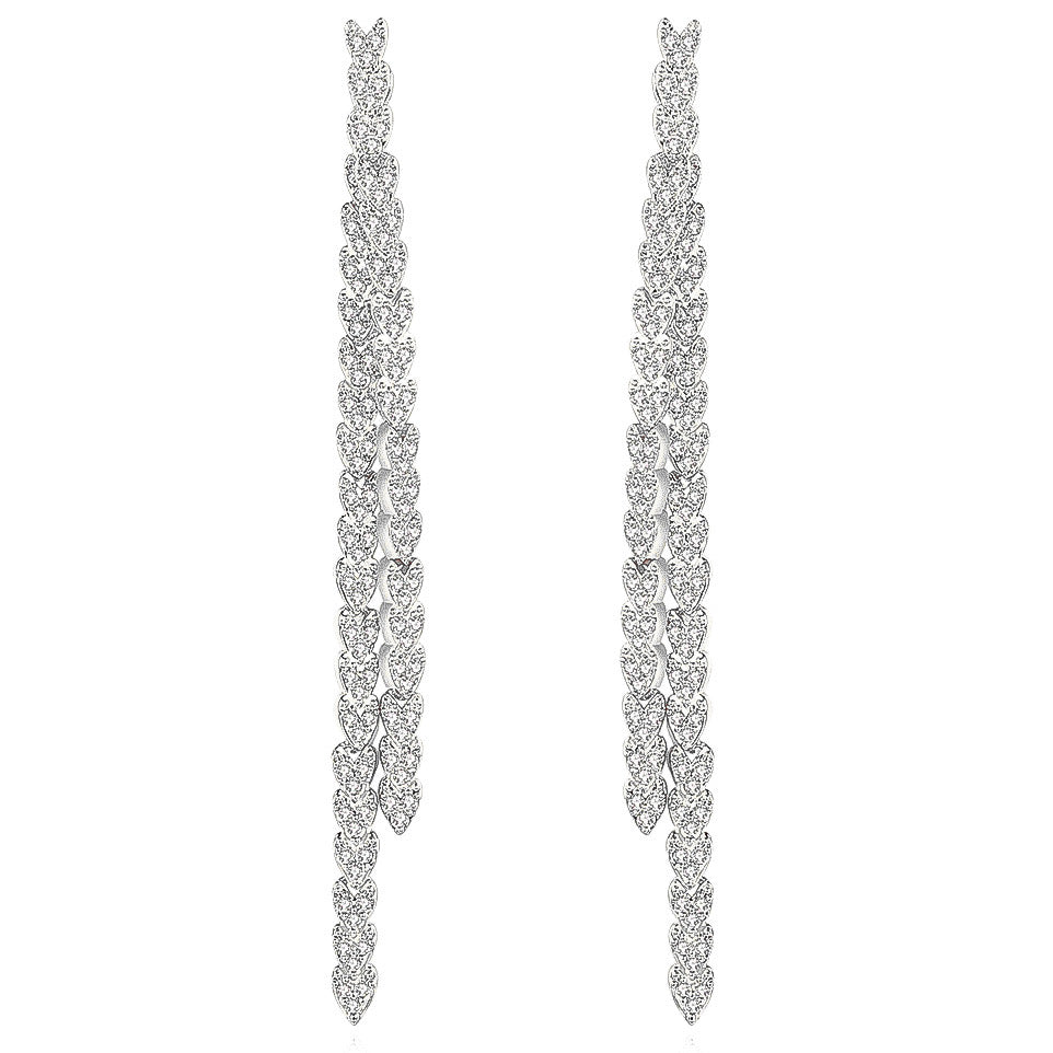 Crystal embellished reversible strand earrings, Long and short crystal strand earrings, Trendsetting front-back earring design, Double strand crystal earrings with sleek finish, As seen on Tess Daly BBC Strictly earrings, Modern reversible crystal shimmer earrings, Playful sparkling crystal earrings