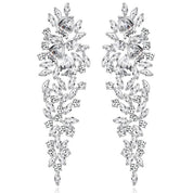 Starlet Supreme earrings, silver drop earrings, long statement earrings, geometric cubic zirconia, sparkling detail, worn by Tess Daly, BBC Strictly Come Dancing, model wearing earrings, evening jewelry, special occasion earrings, elegant design, party earrings, wedding guest jewelry, red carpet style