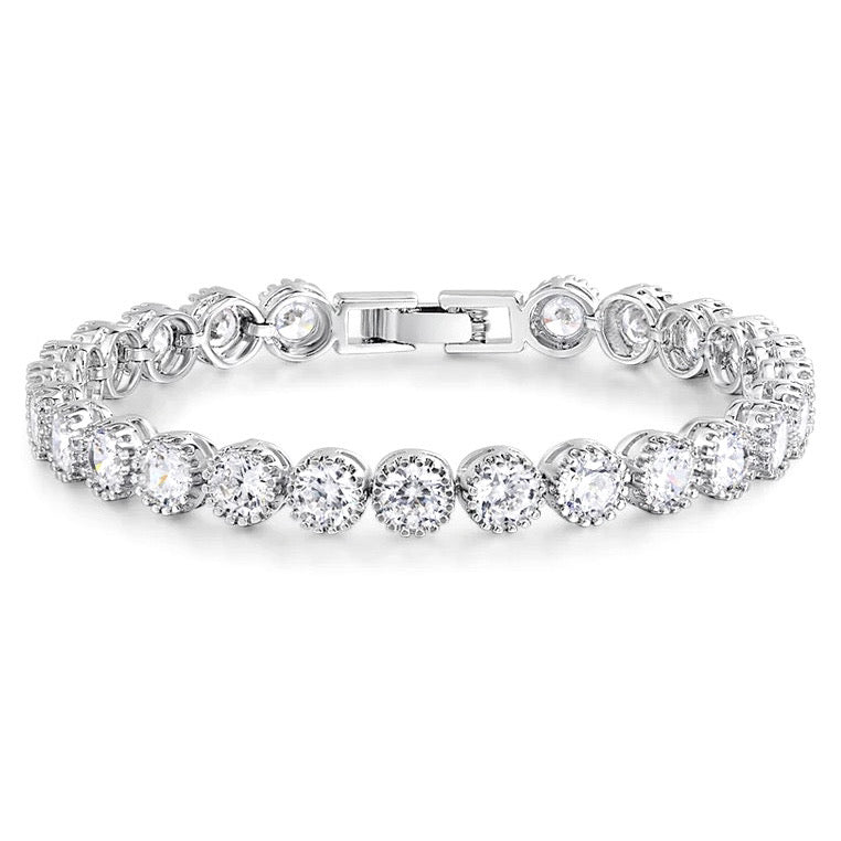 Dainty rhodium-plated tennis bracelet with sparkling 3A cubic zirconia stones in bezel setting, slim 4-5mm width, available in 17cm, 19cm, and 20cm lengths, lightweight and elegant for everyday wear, nickel free, presented in Valentina-Rose gift box.