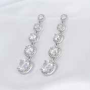 Zara drop earrings with simulated diamonds and pavé halo, white gold-plated brass, 4.6cm long, luxury gift-ready, perfect for special occasions