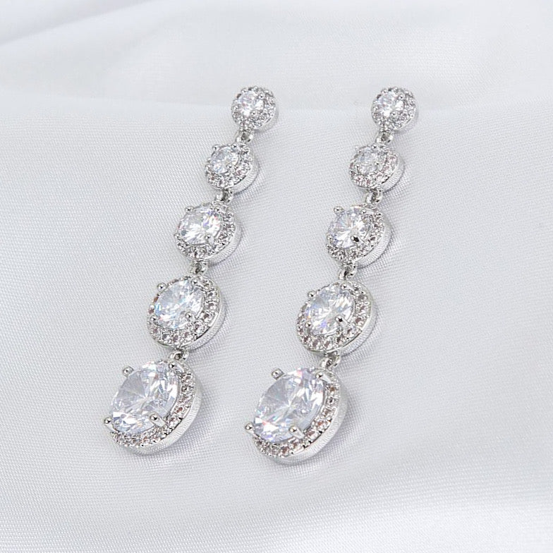 Zara drop earrings with simulated diamonds and pavé halo, white gold-plated brass, 4.6cm long, luxury gift-ready, perfect for special occasions