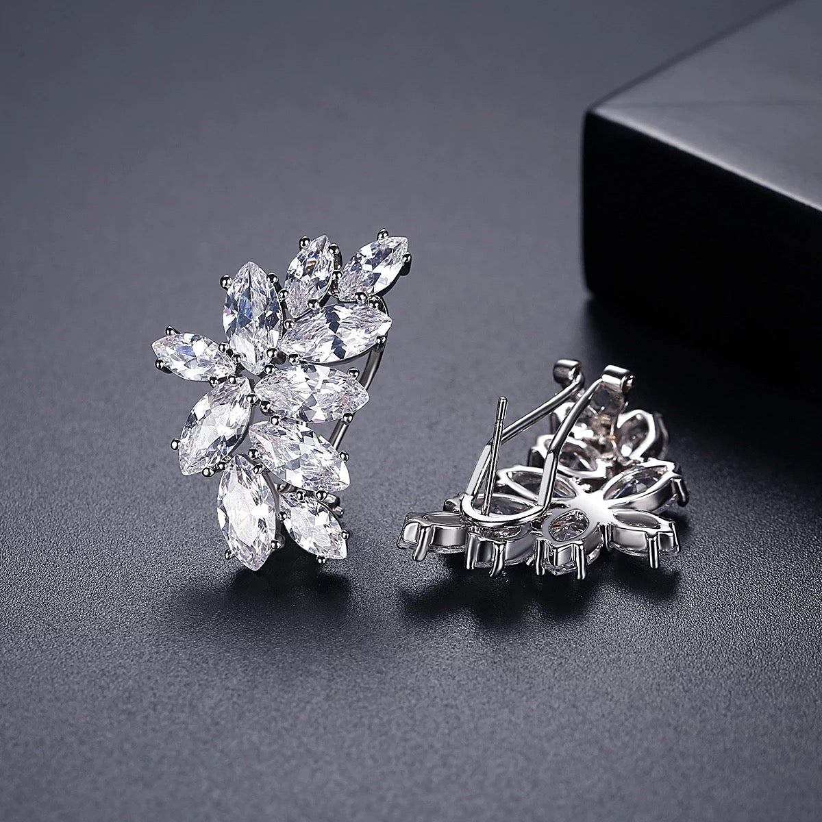 Silver Meghan Cluster Earrings with marquise-cut crystals arranged in an elegant floral cluster, perfect for special occasions or gifting