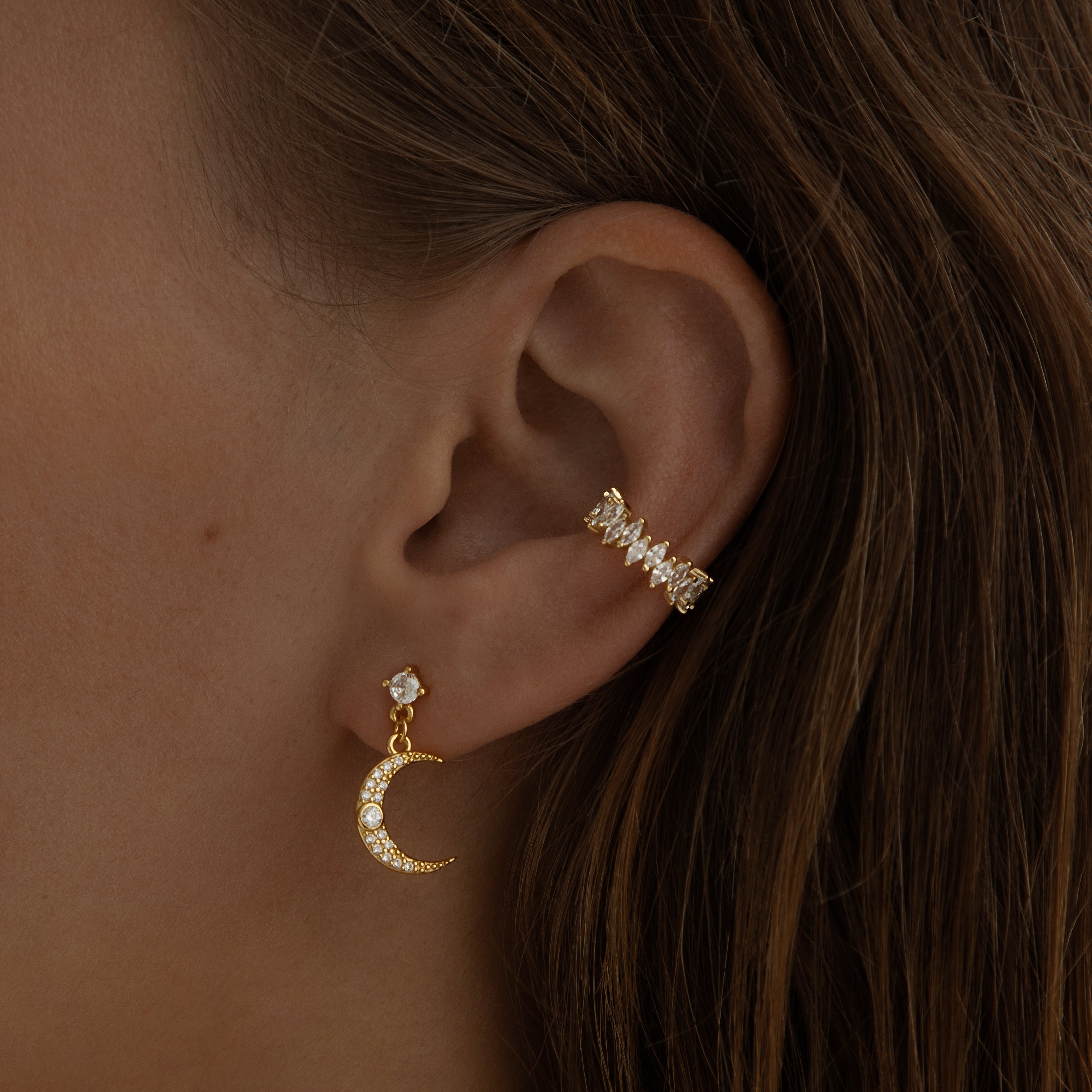 Gold earrings featuring a crescent moon and star design with a polished finish, from the Illuminate Collection by Valentina Rose.
