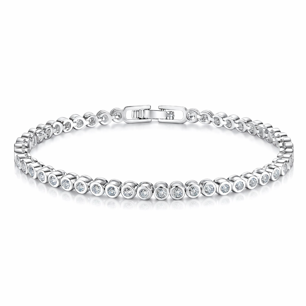 Silver bezel set tennis bracelet with clear stones on a white background
