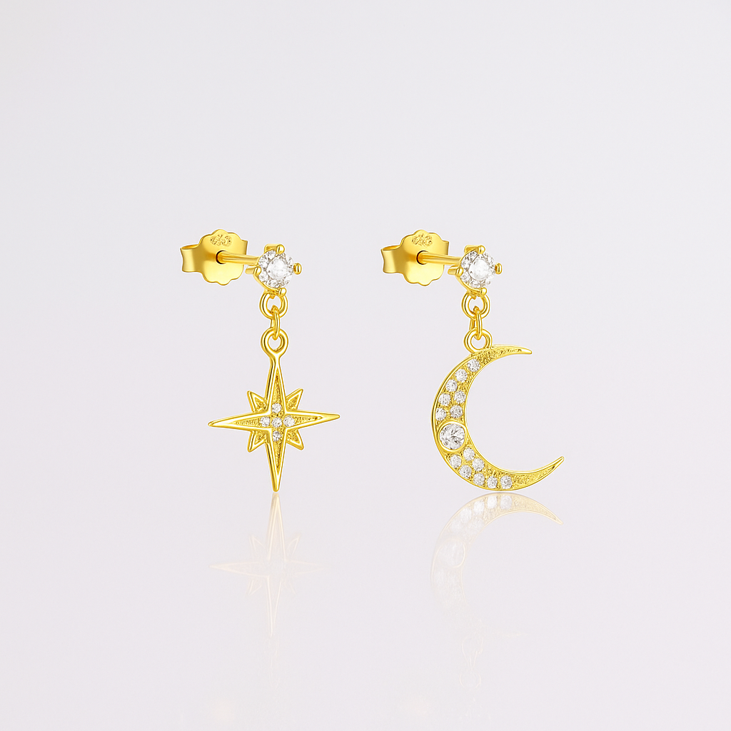Gold earrings featuring a crescent moon and star design with a polished finish, from the Illuminate Collection by Valentina Rose.