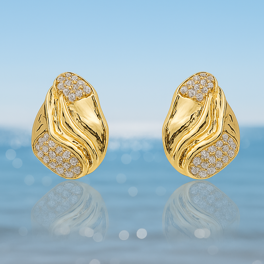 A pair of gold‑plated stud earrings, each shaped like three elegant, tapering wave arches that fan outward in a stylised, goddess-inspired design. The curved strands are smooth, mirror‑polished, and evenly spaced, creating a sense of movement and volume while remaining compact—approximately 1.3 cm tall from post to tip. They appear to sit snugly along the earlobe and fasten with standard push-back posts. The warm metallic sheen and sculptural silhouette evoke a graceful, contemporary luxury vibe.