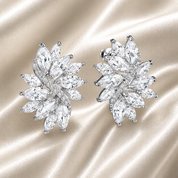 Valentina-Rose crystal cluster stud earrings on ivory silk, sparkling marquise stones in a luxury silver-tone finish, bridal earrings UK and occasion jewellery