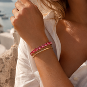Gold bracelet with poppy red Swarovski gemstones 
