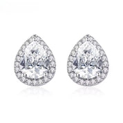 Pair of teardrop-shaped diamond earrings on a white background