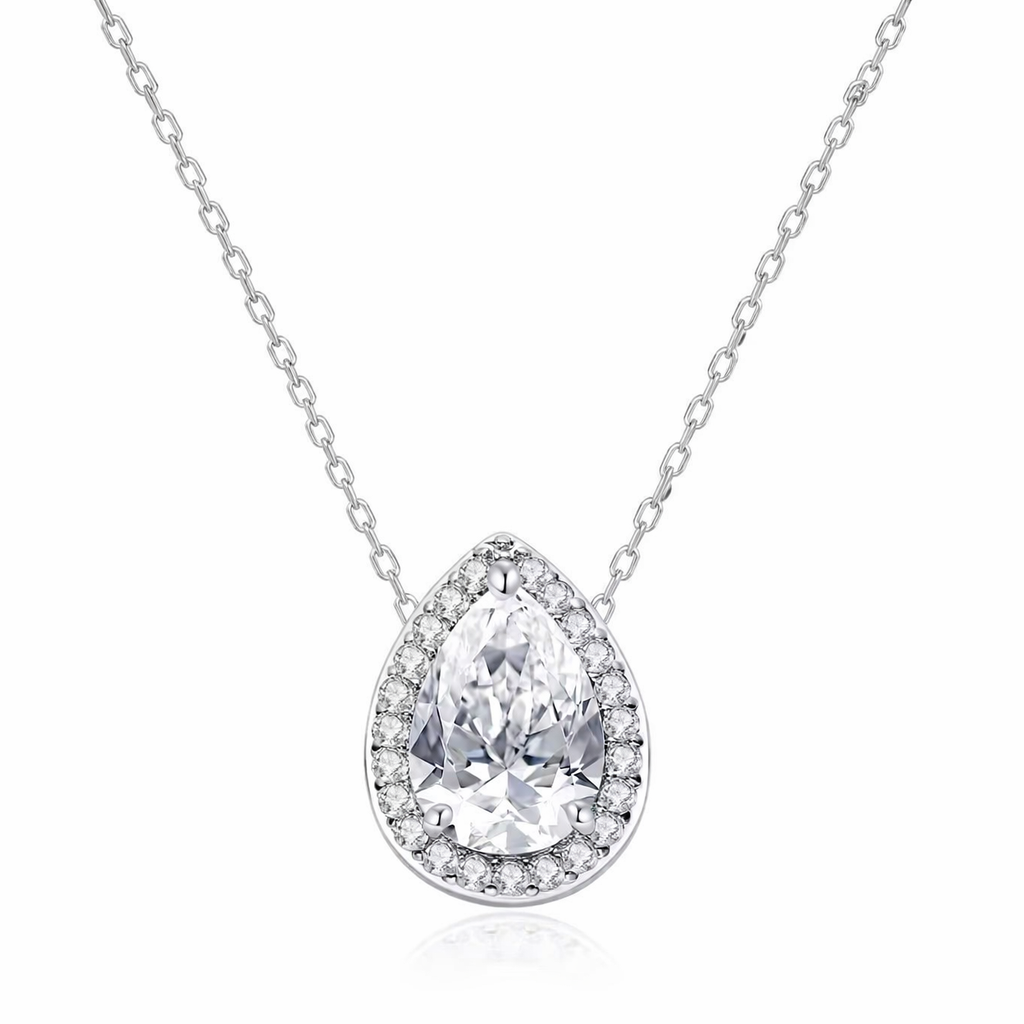 Teardrop-shaped diamond pendant on a chain against a white background