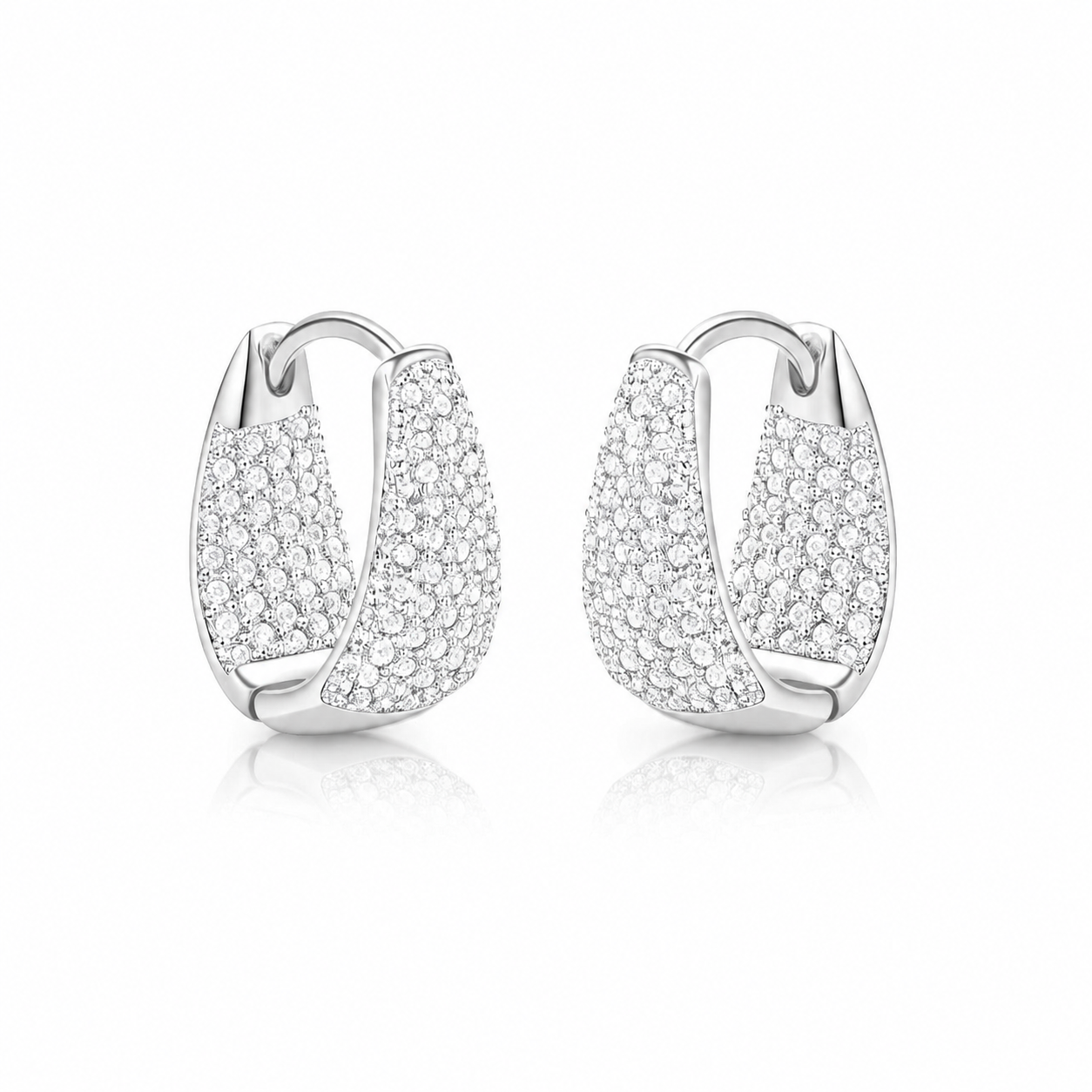 Pair of silver hoop earrings with clear pave cz on a white background