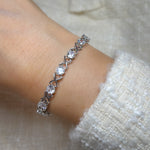 XOXO "Hugs And Kisses' Crystal Tennis Bracelet | Silver
