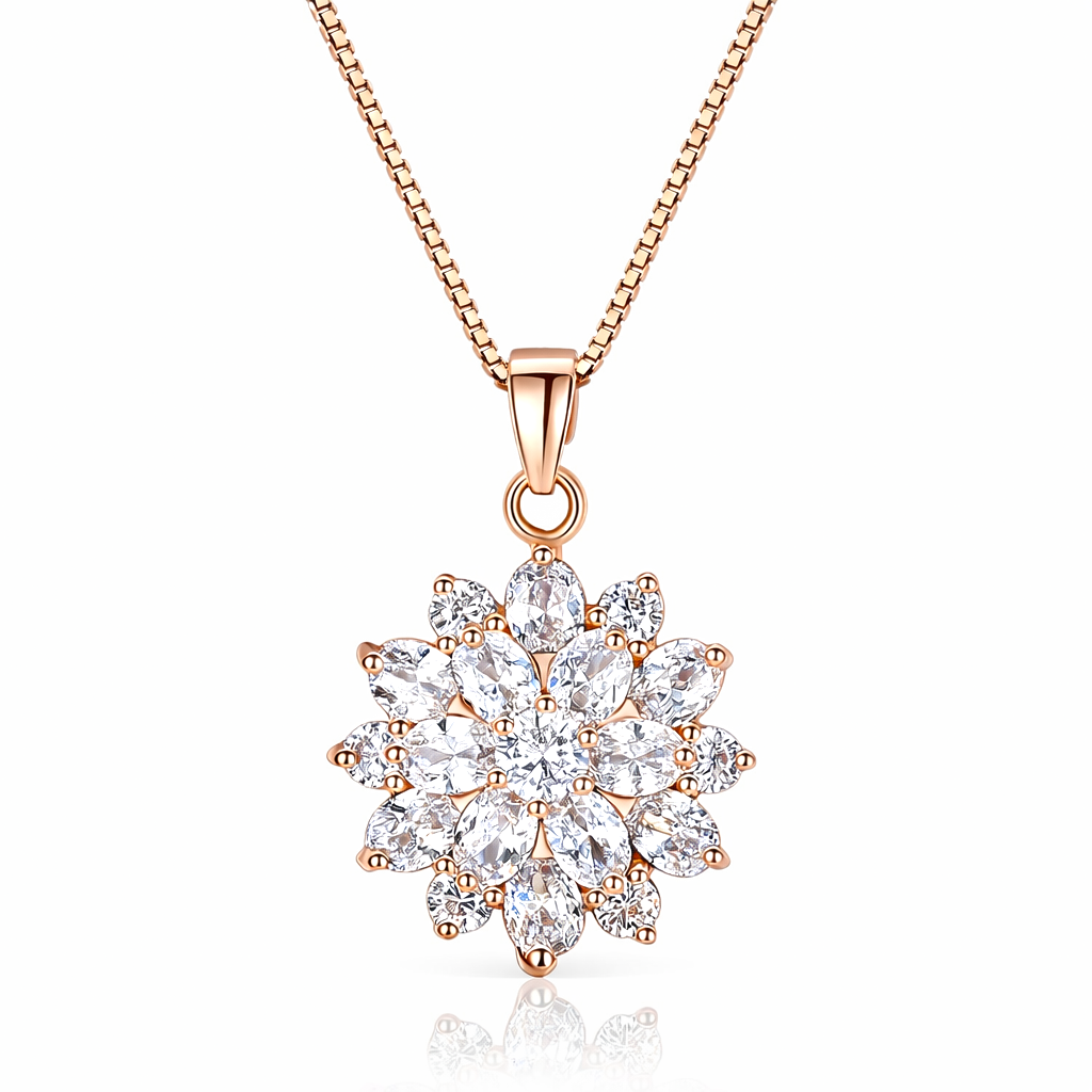 Rose gold necklace with a sparkling cluster marquise pendant on a white background