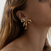 Ribbon Twist Hammered Bow Earrings | Gold