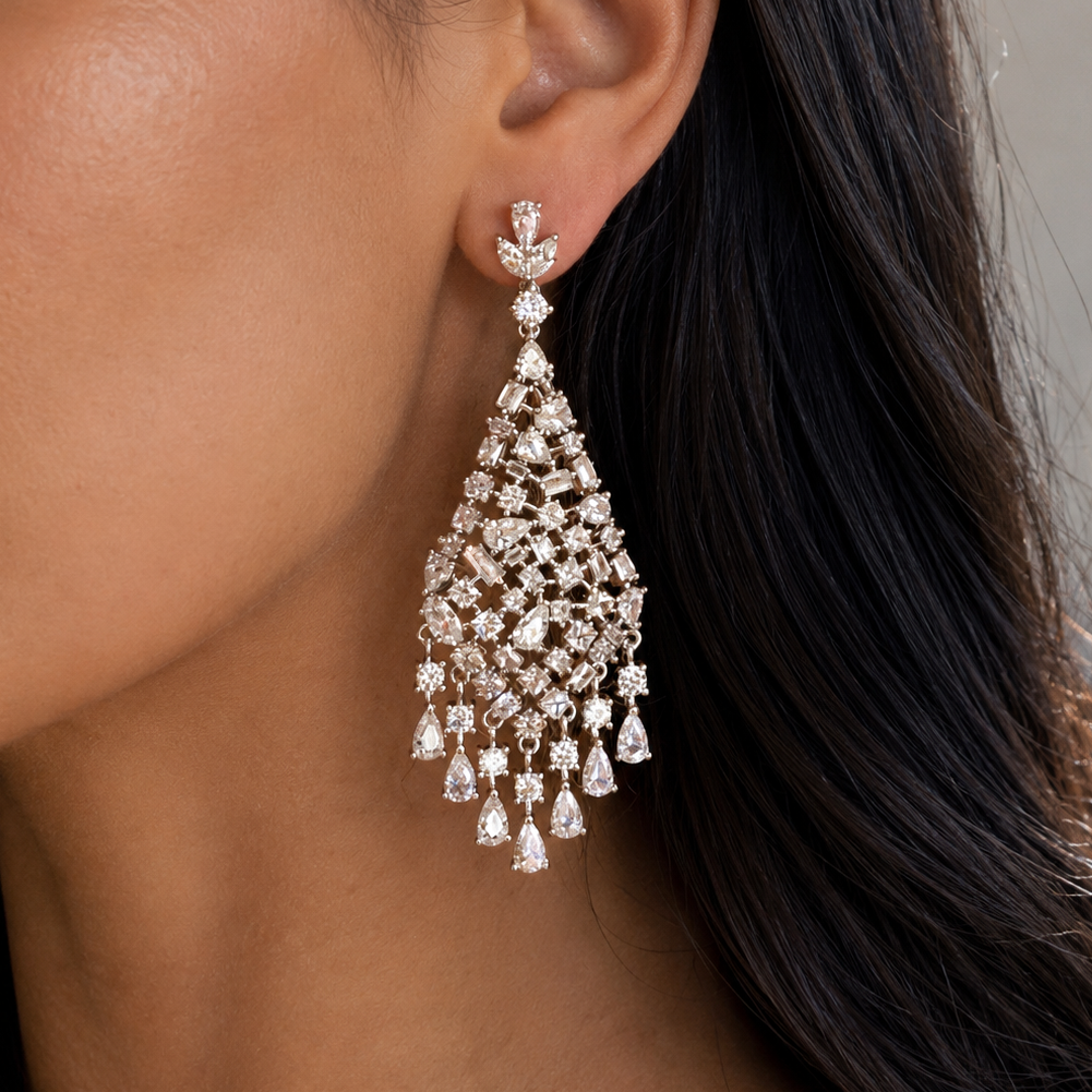 Valentina-Rose model wearing a sparkling chandelier statement silver earring 
