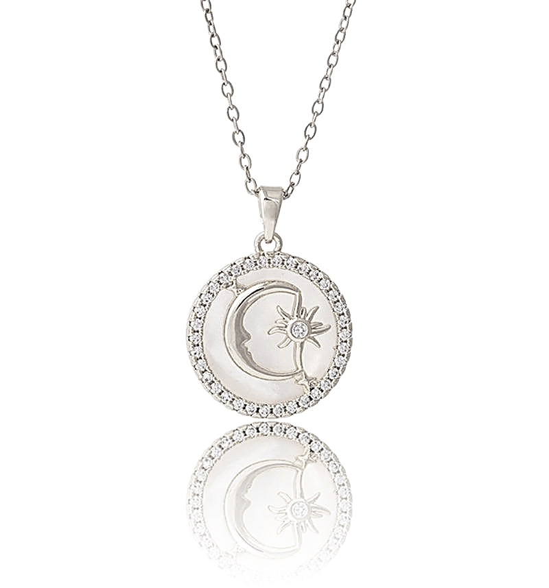 Silver necklace pendant featuring moon and sun designs on a white background.