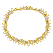 
A delicate gold‑plated link bracelet featuring a whimsical parade of stylised elephant silhouettes, each linked trunk-to-tail. The small elephant charms are uniformly sized with softly rounded bodies and upturned trunks, creating a playful, continuous chain. The bracelet is secured with an integrated box‑style clasp and lays flat when worn, measuring around 18 cm in length. The polished gold finish gives a warm, refined sheen, enhancing its charming, artisan-crafted look.