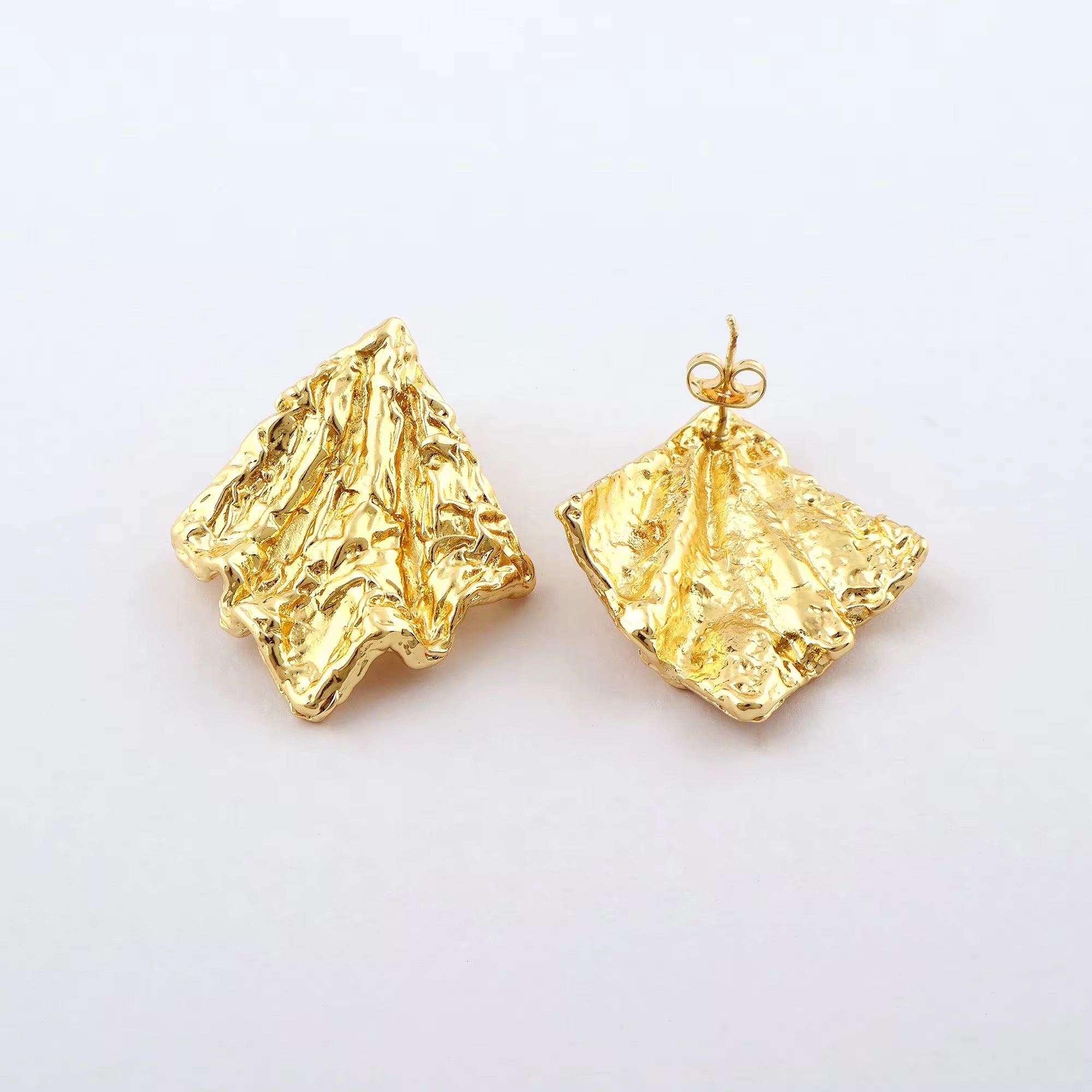 Pair of gold sculptural earrings
