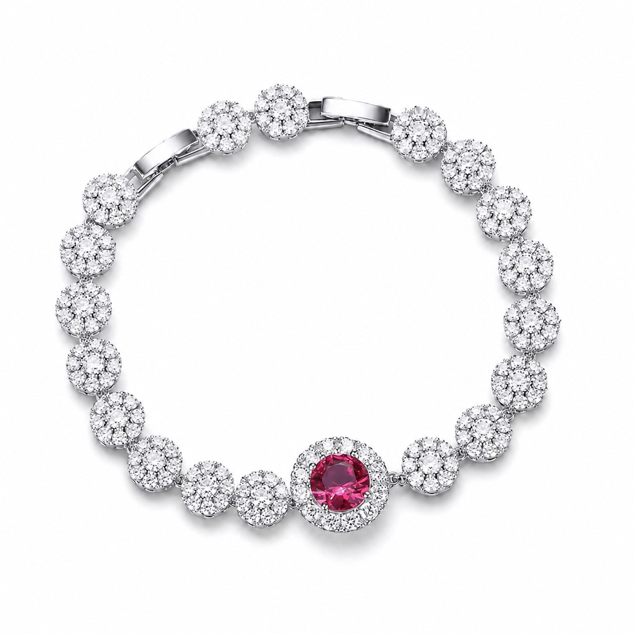 Silver bracelet with a central red gemstone on a white background