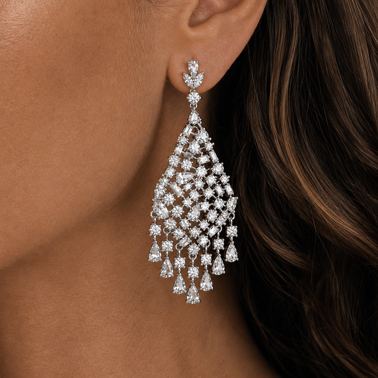 Valentina-Rose model wearing a sparkling chandelier statement silver earring 