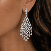 Valentina-Rose model wearing a sparkling chandelier statement silver earring 