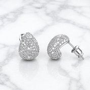Close-up of silver pavé teardrop stud earrings with cubic zirconia – Valentina-Rose