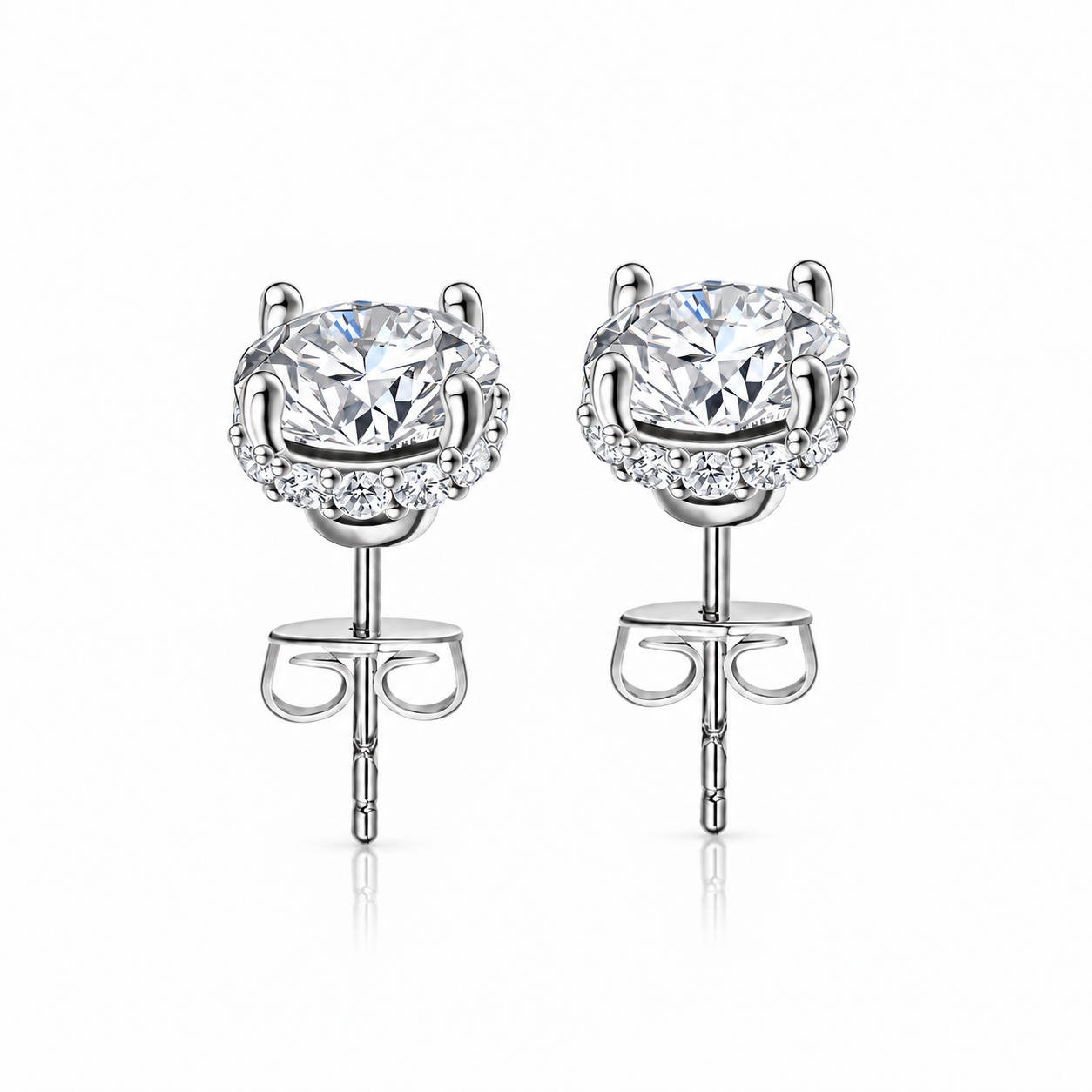 Secret Halo silver stud earrings with round-cut 5A cubic zirconia, delicate hidden halo and four-prong 925 sterling silver setting 