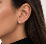 Model wearing Valentina-Rose Secret Halo Stud Earrings Gold with brilliant round-cut stones