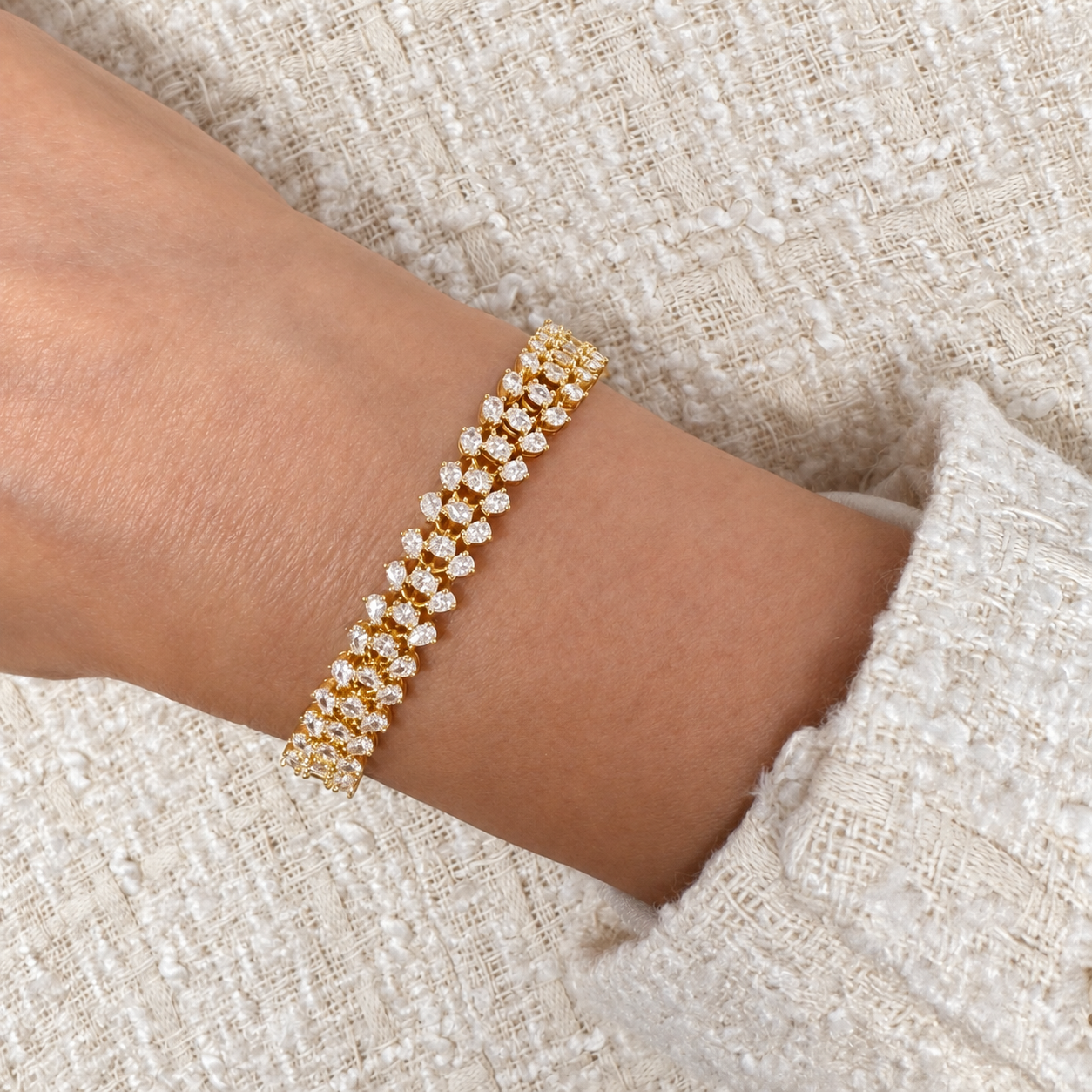 Yasmine gold bracelet worn on the wrist, showing the irregular crystal edge and sparkling stone detail – Valentina-Rose
