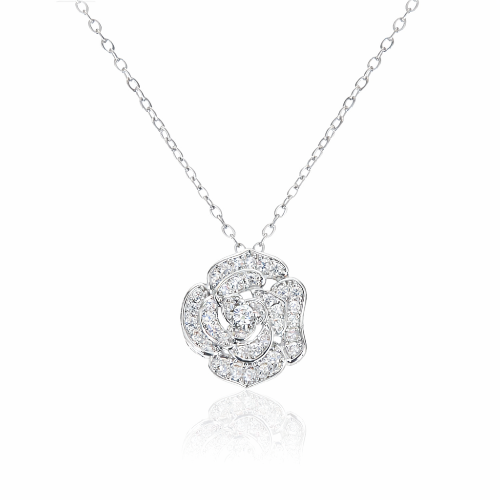 Silver rose-shaped pendant necklace on a white background