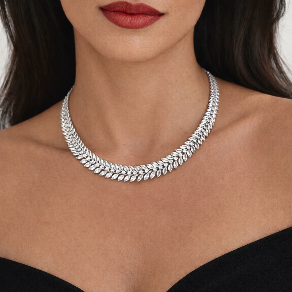 Silver marquise adjustable necklace worn by a model with a blurred background