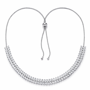 Silver tennis necklace with marquise cut  stones on a white background