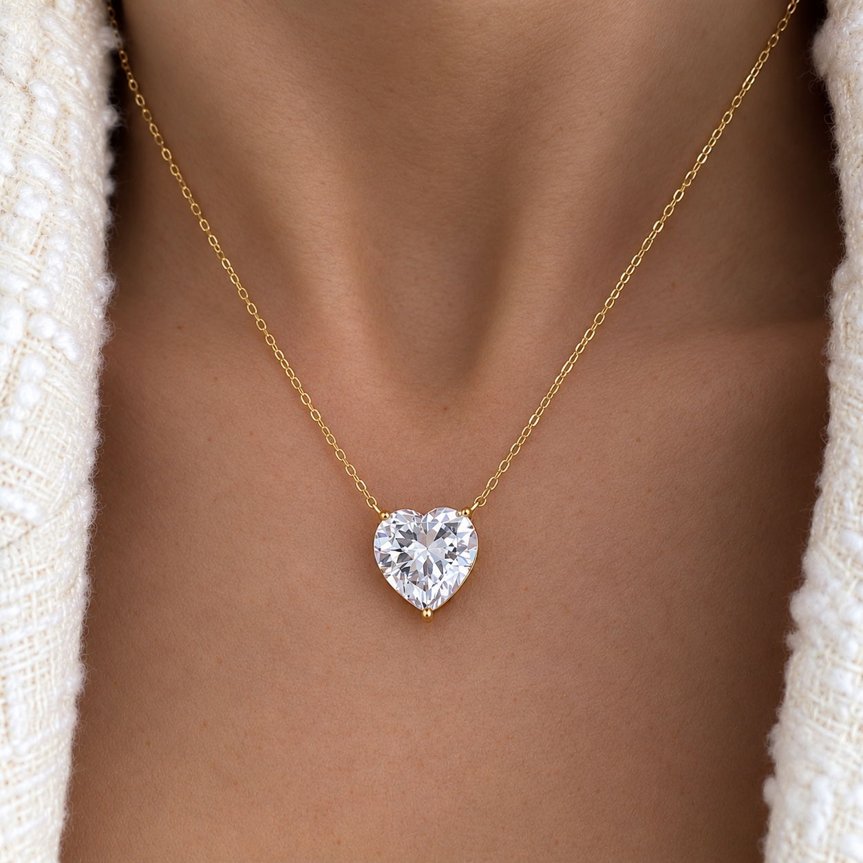 Model wearing delicate gold heart pendant necklace with sparkling clear heart-shaped cubic zirconia – Valentina-Rose